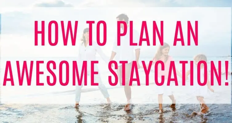 Family walking on a beach during a staycation